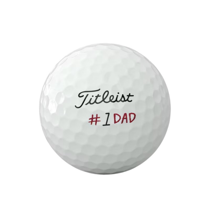 White Titleist golf ball printed with number one dad