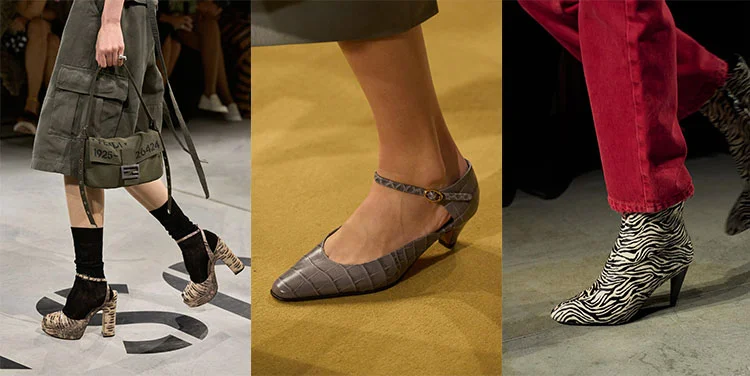 Models on a runway in animal print and reptile-effect footwear