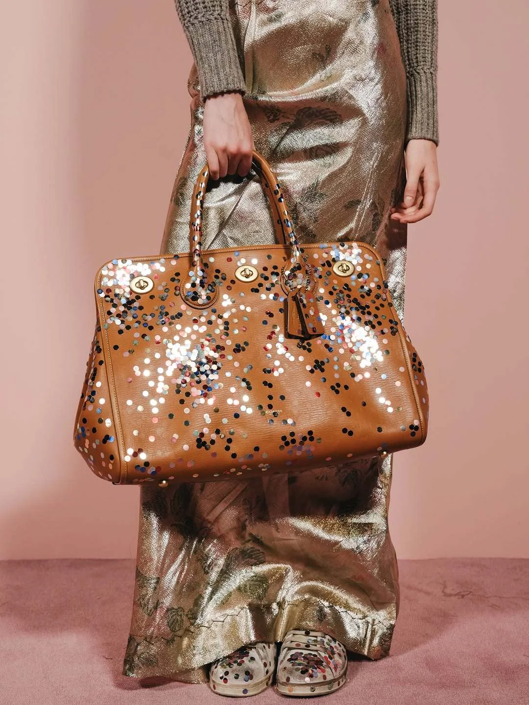 Sequin jacket and tan perforated leather Coach crossbody bag