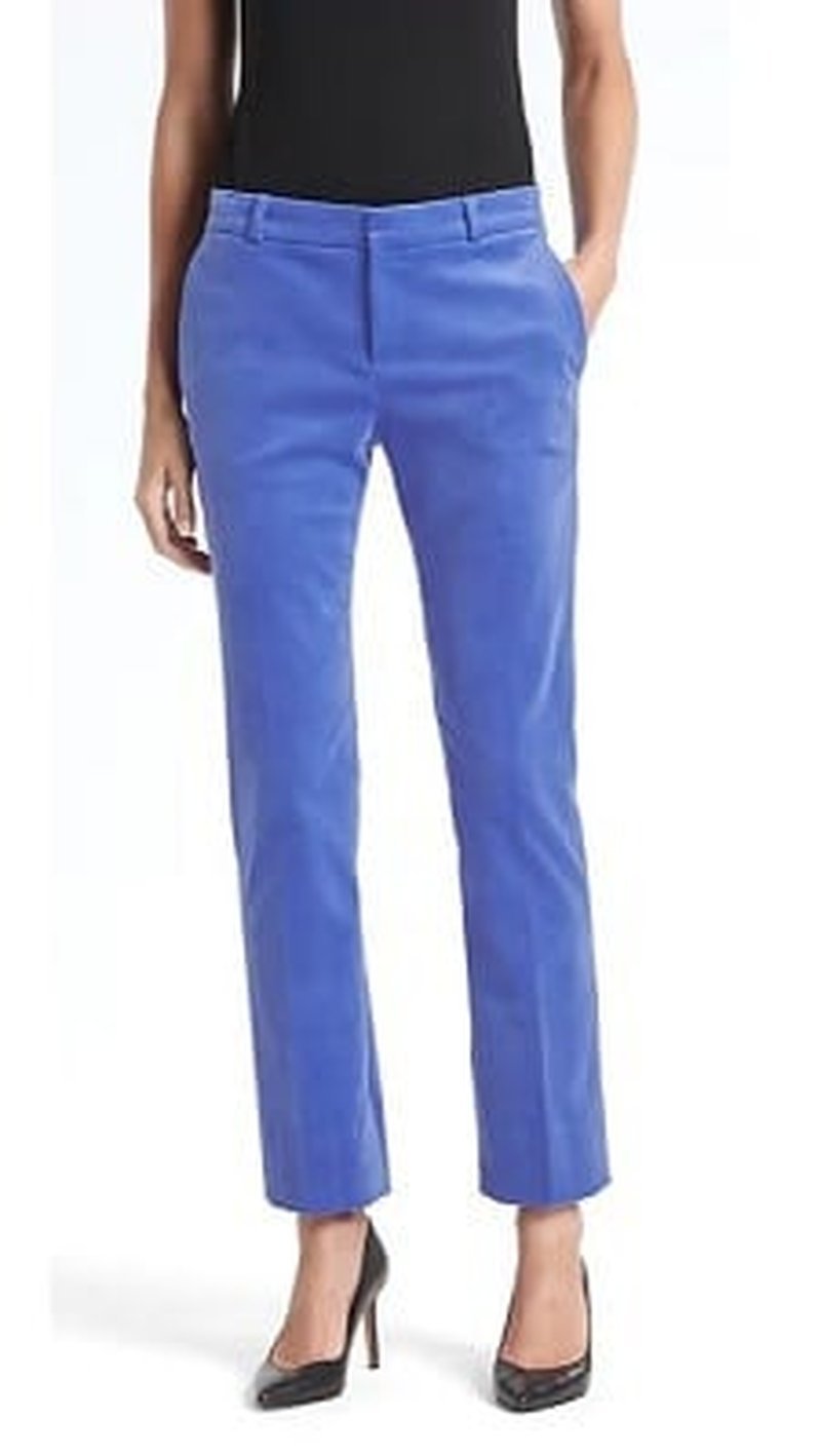 Royal blue tailored cropped trousers styled with black heels