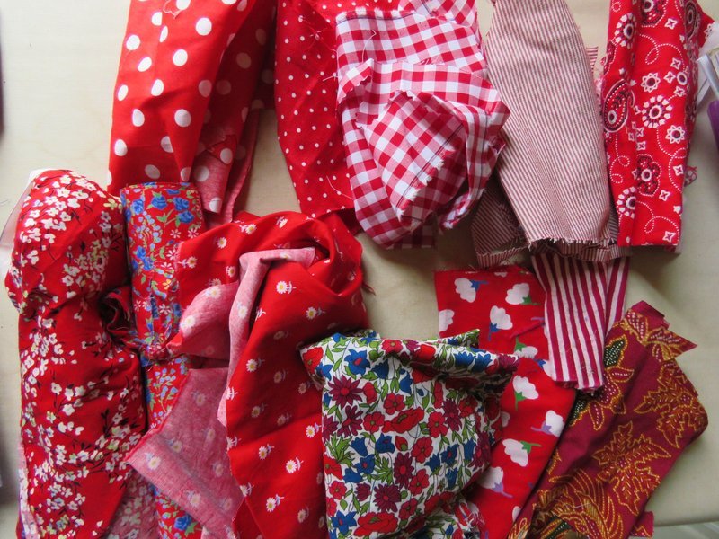 Red and white fabric scrap colorway selected for the necklace