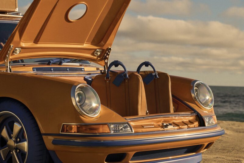 Interior of a vintage convertible with tan quilted leather seats
