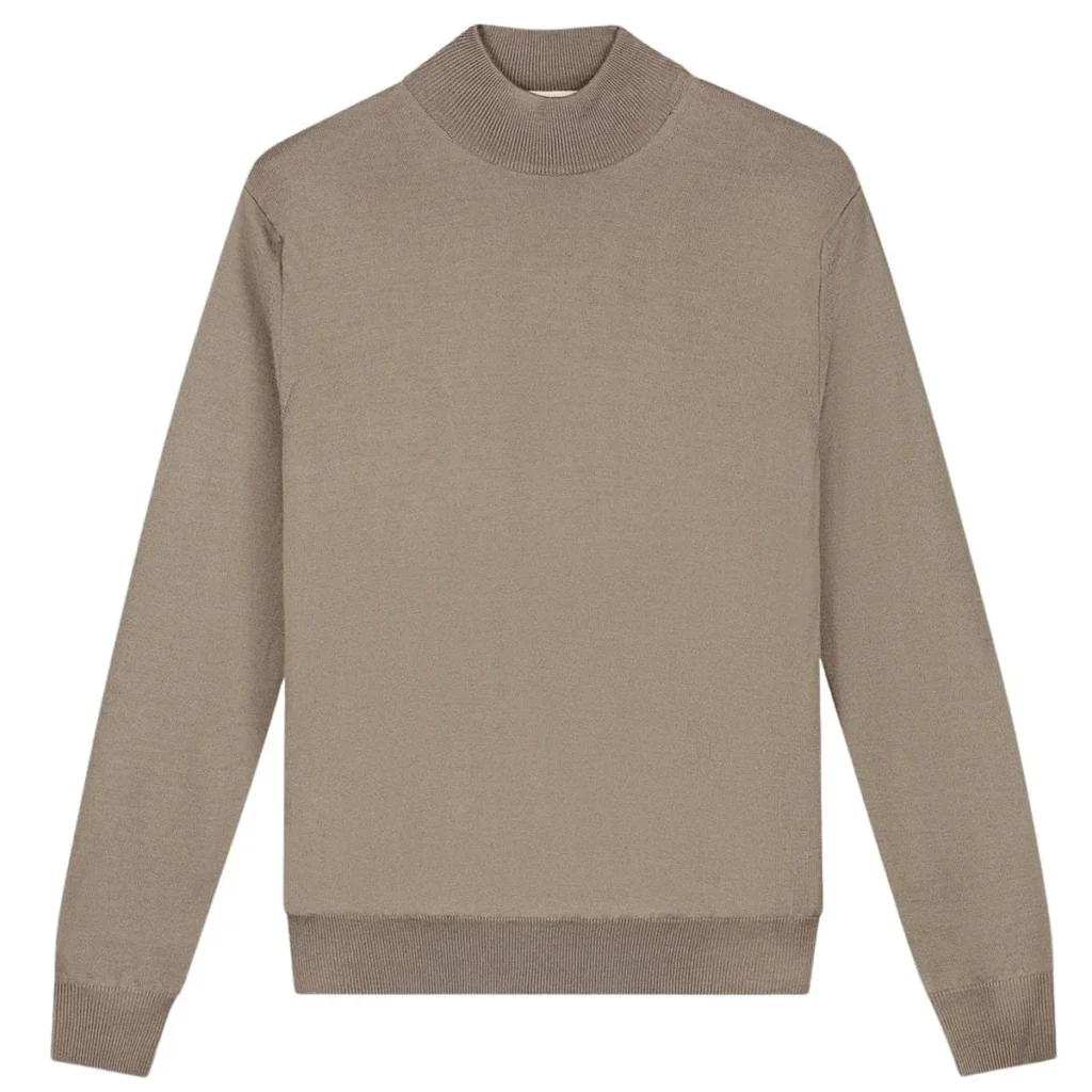 Beige mock-neck sweater laid flat with ribbed cuffs
