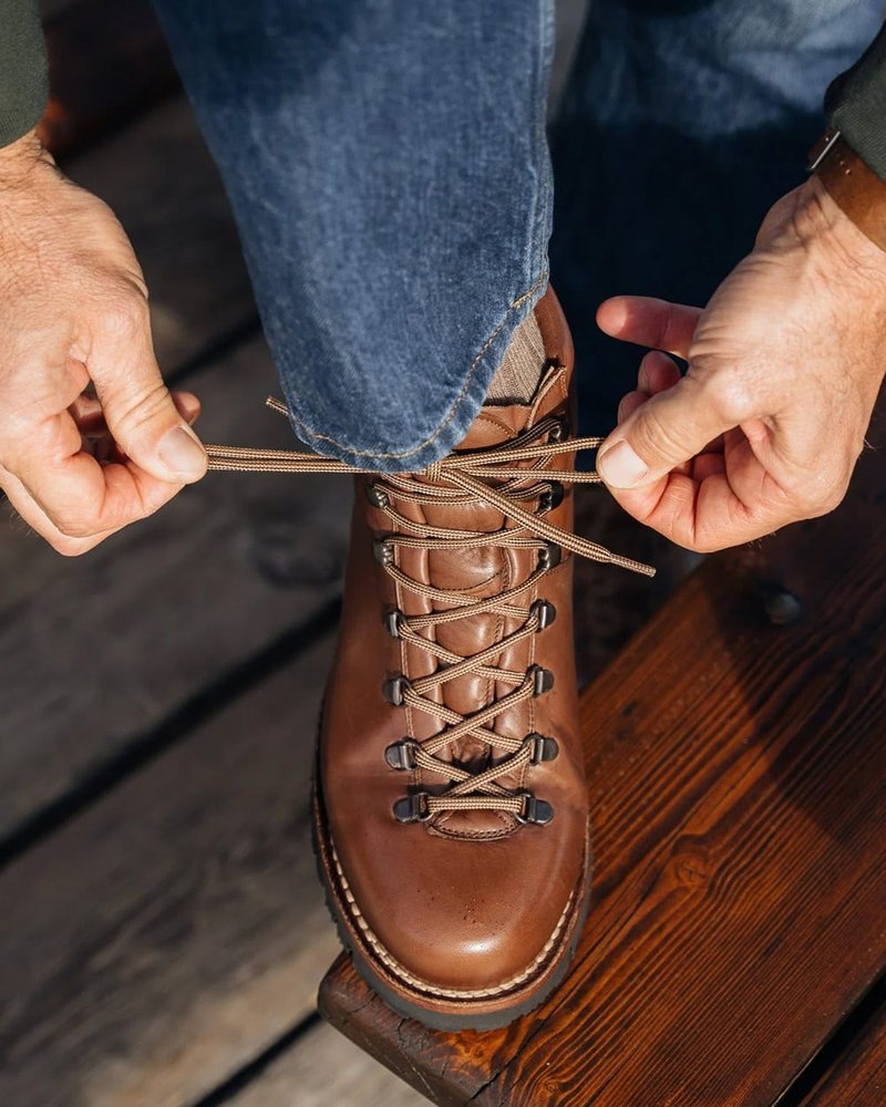 Round-toe leather work boot with substantial rubber sole
