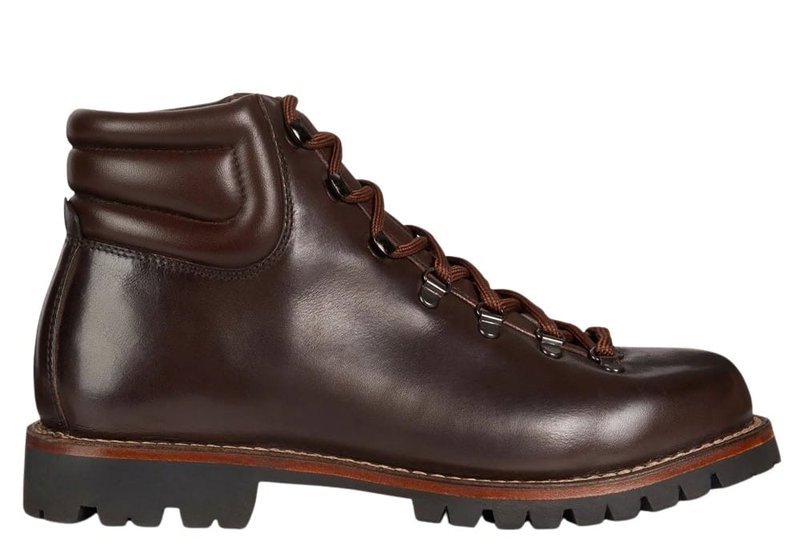 Sleek black leather Chelsea boot with clean low-profile lines